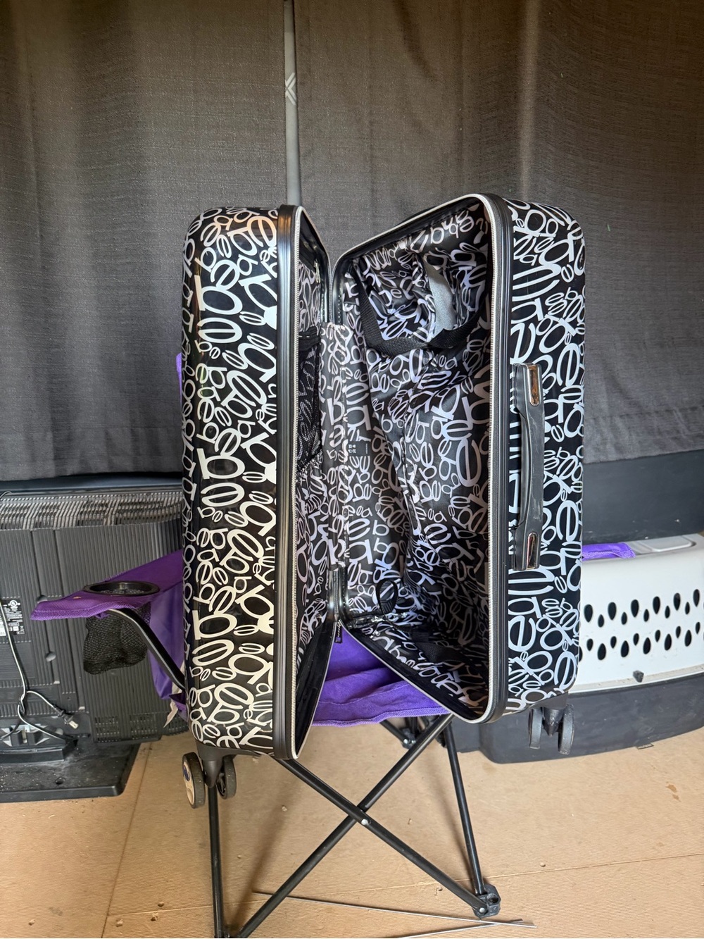 bebe Black and White Graphic Rolling Suitcase
